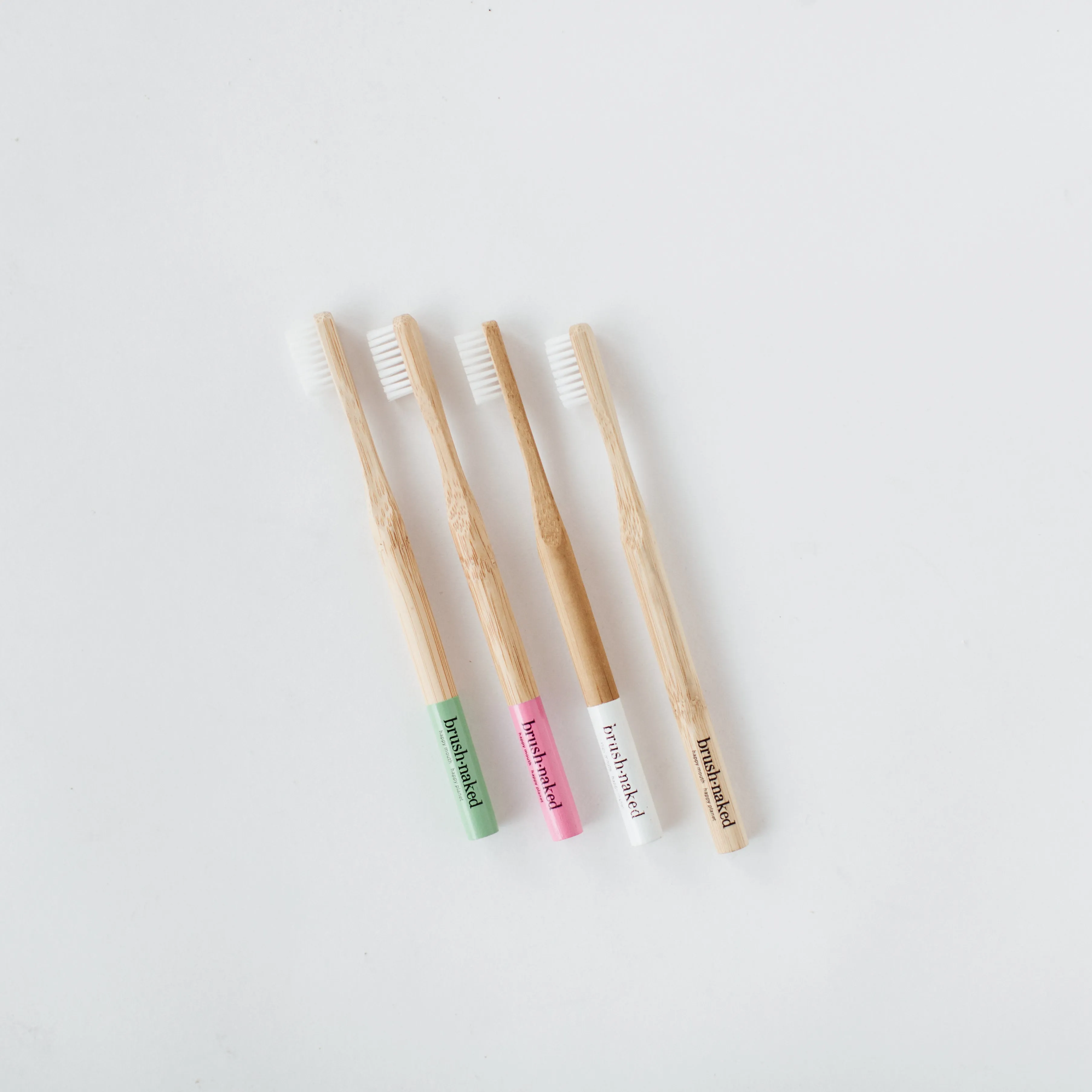 BRUSH NAKED - ADULT NYLON TOOTHBRUSHES - 4 PACK - WHOLESALE